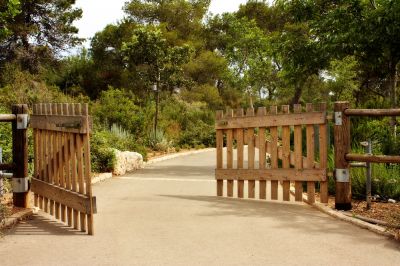Improve Your Home's Appearance with a Wood Gate Installation!